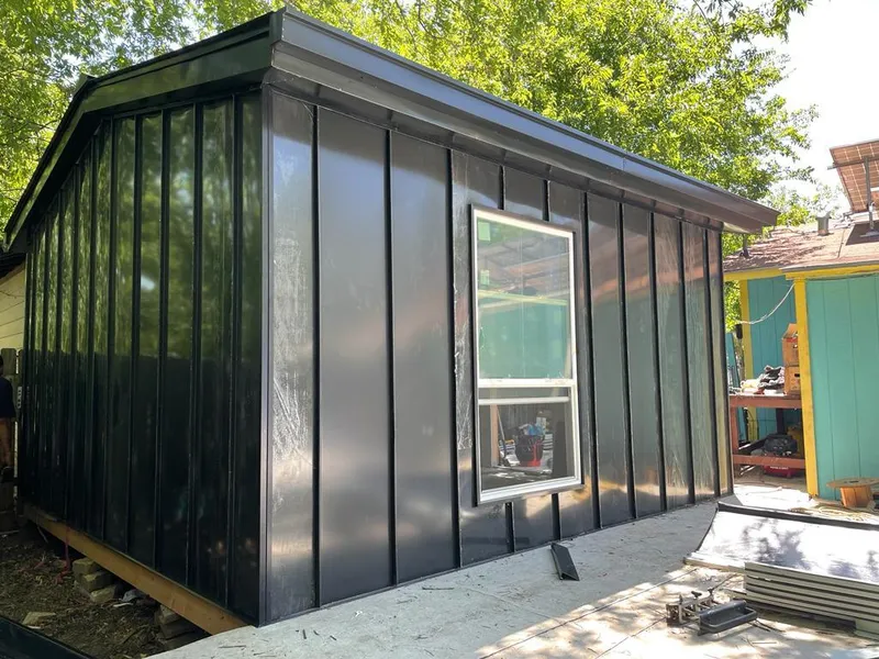 Black standing seam metal wall panels for Roof Inspection in Hillsborough